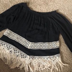 Fringe off the shoulder top